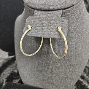 Silver tone hoop earrings
